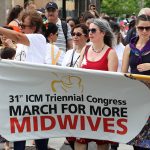 CAM president Katrina Kilroy leads the March for More Midwives, Toronto ON